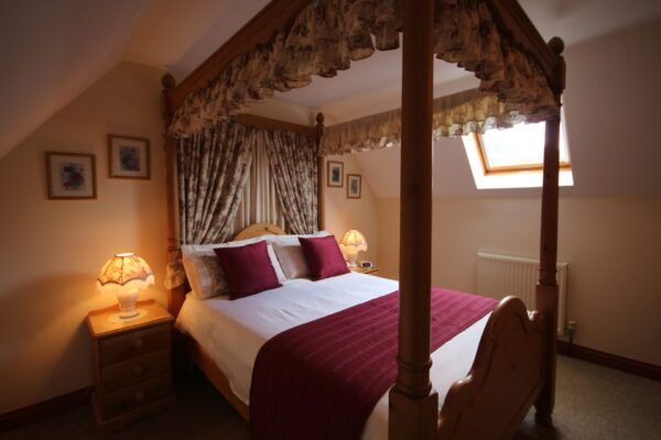 Rafters Barn Four Poster Bedroom